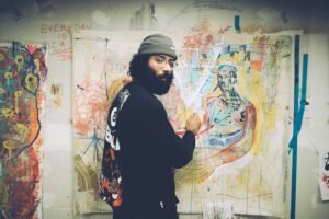 Image of an artist painting 
